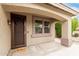 Inviting front porch with security door on front door, window and desert landscaping at 22905 N 19Th Way, Phoenix, AZ 85024