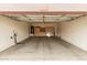 Spacious garage with built-in cabinets and an electric car charger at 22905 N 19Th Way, Phoenix, AZ 85024