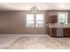 Dining area adjacent to the kitchen, featuring tiled flooring at 22905 N 19Th Way, Phoenix, AZ 85024