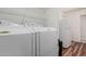 Convenient laundry room with washer, dryer, and vinyl floors for easy cleaning at 22905 N 19Th Way, Phoenix, AZ 85024