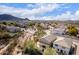 View of a desert suburban neighborhood with mountain views and diverse landscaping at 22905 N 19Th Way, Phoenix, AZ 85024