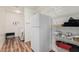 Walk-in pantry with lots of shelving, storage and newer vinyl floors at 22905 N 19Th Way, Phoenix, AZ 85024