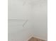 Well-lit walk-in closet offers efficient organization with wire shelving at 22905 N 19Th Way, Phoenix, AZ 85024