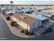 Aerial view of a home showing the front exterior and its location within a quiet community at 2550 E Ellsworth Rd # 791, Mesa, AZ 85209