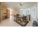 Elegant dining area with tile flooring and a modern chandelier at 2550 E Ellsworth Rd # 791, Mesa, AZ 85209