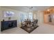 Bright dining area with white plantation shutters and a stylish buffet at 2550 E Ellsworth Rd # 791, Mesa, AZ 85209