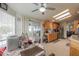 Bright kitchen featuring floral wallpaper, a breakfast nook and sliding doors to an outdoor patio at 2550 E Ellsworth Rd # 791, Mesa, AZ 85209