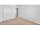 Bedroom with carpeted flooring, a spacious closet, and neutral paint at 2815 W Charleston Ave, Phoenix, AZ 85053