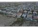 Aerial view of a large community in the desert with houses featuring private swimming pools at 30402 W Vale Dr, Buckeye, AZ 85396