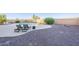 Backyard with a pool and desert landscaping featuring lounge chairs and a fire pit at 30402 W Vale Dr, Buckeye, AZ 85396