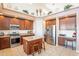 Charming kitchen featuring stainless steel appliances and an island with seating at 30402 W Vale Dr, Buckeye, AZ 85396