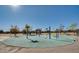 A colorful splash pad offers a fun water play area for  at 30402 W Vale Dr, Buckeye, AZ 85396