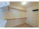 Walk-in closet with adjustable shelving and rods for optimal storage at 309 E Mountain Sky Ave, Phoenix, AZ 85048