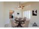 Cozy dining room with elegant furnishings, neutral tones, and stylish window treatments at 309 E Mountain Sky Ave, Phoenix, AZ 85048