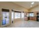 Bright kitchen nook features a round table, views of the backyard, and a kitchen with granite counters at 309 E Mountain Sky Ave, Phoenix, AZ 85048