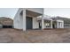 Contemporary home featuring a roof top deck with spiral staircase, large garage door, and modern architecture at 37931 N 31St Ave, Phoenix, AZ 85086