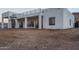 Modern home featuring a rooftop terrace with a spiral staircase, and a large, unfinished yard at 37931 N 31St Ave, Phoenix, AZ 85086