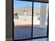 Slider door leads to the back yard, with mountain views, and paver patio at 37931 N 31St Ave, Phoenix, AZ 85086