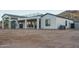 Modern home with a garage, second-story patio, spiral staircase, and large, vacant lot at 37937 N 31St Ave, Phoenix, AZ 85086