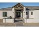 Inviting front entrance boasting a tiled walkway, neutral colored exterior, and modern design at 37937 N 31St Ave, Phoenix, AZ 85086