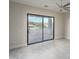 Room featuring sliding glass door with access to the outdoor space and mountain views at 37937 N 31St Ave, Phoenix, AZ 85086