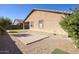 Spacious backyard with gravel, pavers and artificial grass, perfect for outdoor living at 6109 S 30Th Dr, Phoenix, AZ 85041