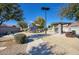 Community playground featuring a slide, swings, covered picnic area, and lush landscaping at 6109 S 30Th Dr, Phoenix, AZ 85041