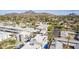 This aerial view showcases the neighborhood, surrounding community, and beautiful mountain views at 6301 N 12Th St # 14, Phoenix, AZ 85014