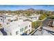 Stunning aerial view of a modern apartment complex in the heart of the city with mountain views at 6301 N 12Th St # 14, Phoenix, AZ 85014