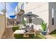 A cozy backyard features artificial grass, outdoor furniture, and space for relaxation at 6301 N 12Th St # 14, Phoenix, AZ 85014