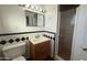 Bathroom featuring a toilet, vanity, mirror, and walk-in shower at 6413 E Holly St, Scottsdale, AZ 85257