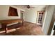 Bright dining room featuring tile floors, ample natural light, and a rustic table at 6413 E Holly St, Scottsdale, AZ 85257