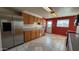 Bright kitchen with tile floors, stainless steel appliances, and oak cabinets at 6413 E Holly St, Scottsdale, AZ 85257