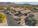 Home in a desert community featuring desert landscaping and mountain views at 6589 E Casa De Leon Ln, Gold Canyon, AZ 85118