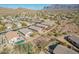 Homes in a desert community featuring backyard pools and mountain views at 6589 E Casa De Leon Ln, Gold Canyon, AZ 85118