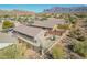 Aerial view of home featuring a fenced backyard with desert landscaping at 6589 E Casa De Leon Ln, Gold Canyon, AZ 85118