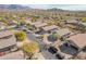 Aerial view of a community featuring desert landscaping and mountain views at 6589 E Casa De Leon Ln, Gold Canyon, AZ 85118