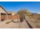 Backyard with low-maintenance desert landscaping, a small cactus garden, and views of the mountains at 6589 E Casa De Leon Ln, Gold Canyon, AZ 85118