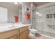 Bright bathroom featuring tiled shower and single vanity at 6589 E Casa De Leon Ln, Gold Canyon, AZ 85118