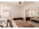 Bedroom featuring plush carpet, mirrored closet, and ample natural light at 6589 E Casa De Leon Ln, Gold Canyon, AZ 85118