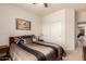 Bedroom with ceiling fan, plush carpet, and closet at 6589 E Casa De Leon Ln, Gold Canyon, AZ 85118