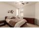 Bedroom with ceiling fan, plush carpet, and ample natural light at 6589 E Casa De Leon Ln, Gold Canyon, AZ 85118