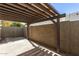 Charming covered patio area, perfect for outdoor dining and relaxation at 7345 E Rovey Ave, Scottsdale, AZ 85250