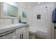 Charming bathroom featuring a modern vanity, quartz countertop, framed mirror, and shower-tub combo at 7920 E Via Camello -- # 49, Scottsdale, AZ 85258