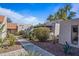 Exterior of a home featuring desert landscaping with cacti and neutral tones at 7920 E Via Camello -- # 49, Scottsdale, AZ 85258