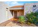 Charming front entrance with desert landscaping and a cozy entryway with a red tile roof at 7920 E Via Camello -- # 49, Scottsdale, AZ 85258