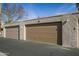 Two-car garage featuring stucco walls, offering ample parking and storage space at 7920 E Via Camello -- # 49, Scottsdale, AZ 85258