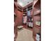 Large walk-in closet with custom shelving, organization, and ample storage space at 800 W Palo Brea Dr, Litchfield Park, AZ 85340