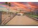 Residents can enjoy friendly games on the shuffleboard court, with a picturesque sunset backdrop at 8012 E Monte Ave, Mesa, AZ 85209