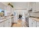 Bright kitchen with white cabinets, granite countertops, and stainless steel appliances at 8499 E Jumping Cholla Dr, Gold Canyon, AZ 85118